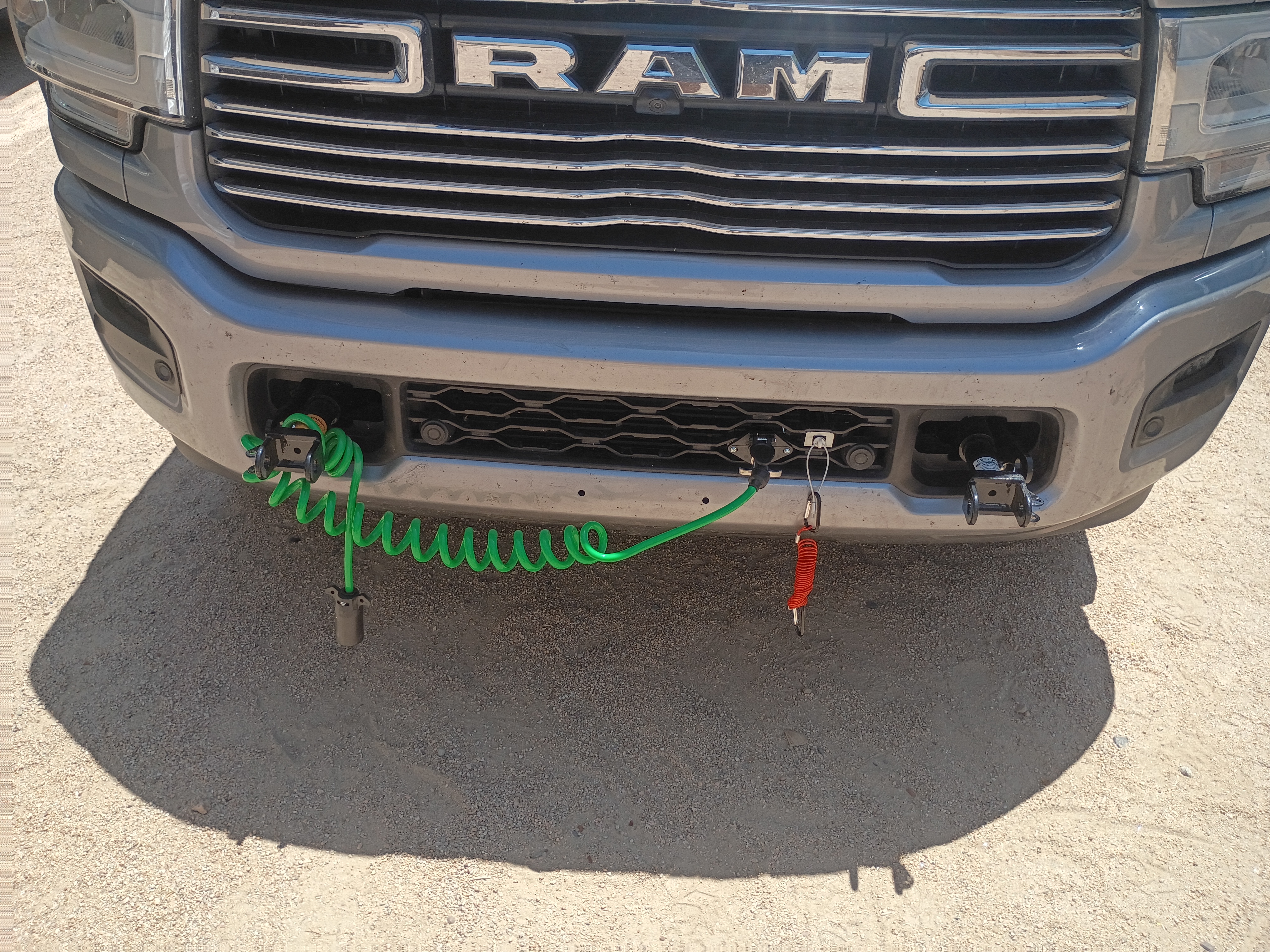 Here is the visual content description in the requested format: The image shows a drawer organiser full of trailer coupler...